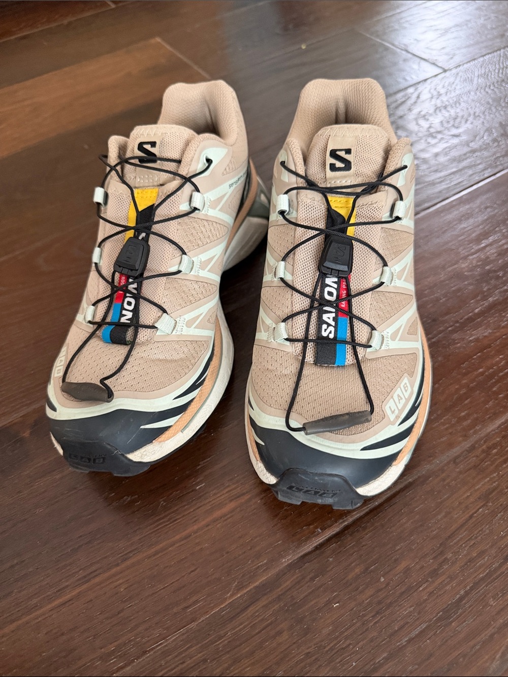 Salomon XT-6 Sneakers in Beige with Black and Blue Accents